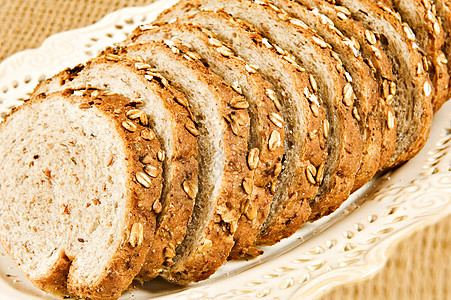 整个健康小麦面包切片早餐厨房脆皮团体粮食食物面团美食生活饮食图片
