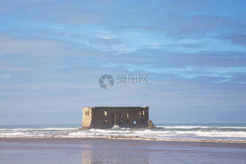 Boujdour海滩支撑植物群天空海岸线海洋海岸荒野沙漠房子邮政图片