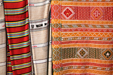 色彩多彩的制造画幅文化红色羊毛水平产品纺织品商品街头市场小地毯图片