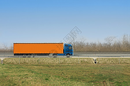 卡车天空运动整车橙子后勤船运交通贸易速度蓝色图片