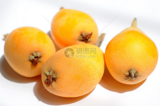 Loquat 水果热带白色橙子黄色素食主义者李子植物小吃季节性粳稻图片