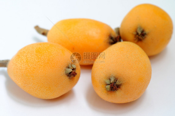 Loquat 水果季节饮食热带季节性食物素食主义者植物李子橙子黄色图片