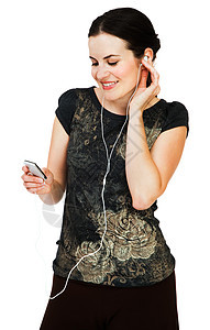 妇女监听MP3白色微笑女士享受衣服幸福听力爱好音乐技术图片