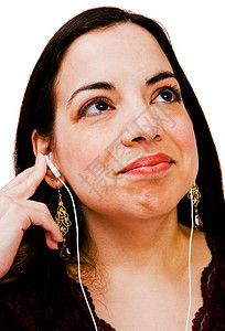 快乐的听音乐女人娱乐女士闲暇听力混血中年人耳塞姿势乐趣技术图片