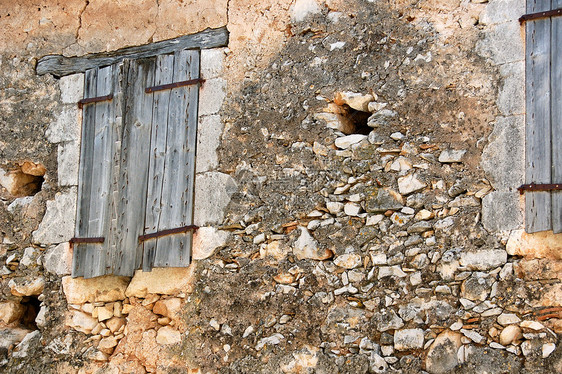墙壁窗口剥皮衰变房子木板快门裂缝风化恶化木头石头图片