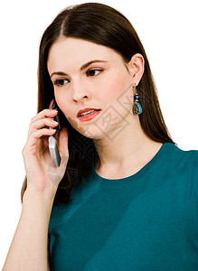 美丽的女人在手机上聊天衣服沟通女士细胞白色机动性听力电讯青色姿势图片