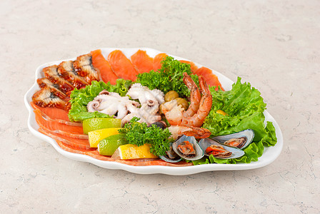 海食沙拉盘子青菜小吃海鲜美食章鱼贝类牡蛎对虾树叶图片