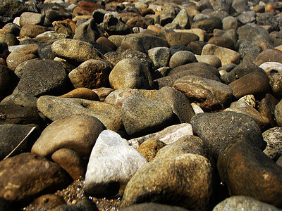 石头圆形白色黄色海滩棕色岩石背景图片