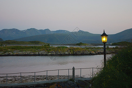 大西洋北部各岛屿悬崖海岸线巡航反射薄雾海洋天空假期海岸石头图片