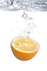 橙子掉入水中宏观气泡反射食物打扫白色海浪活力飞溅洗涤图片