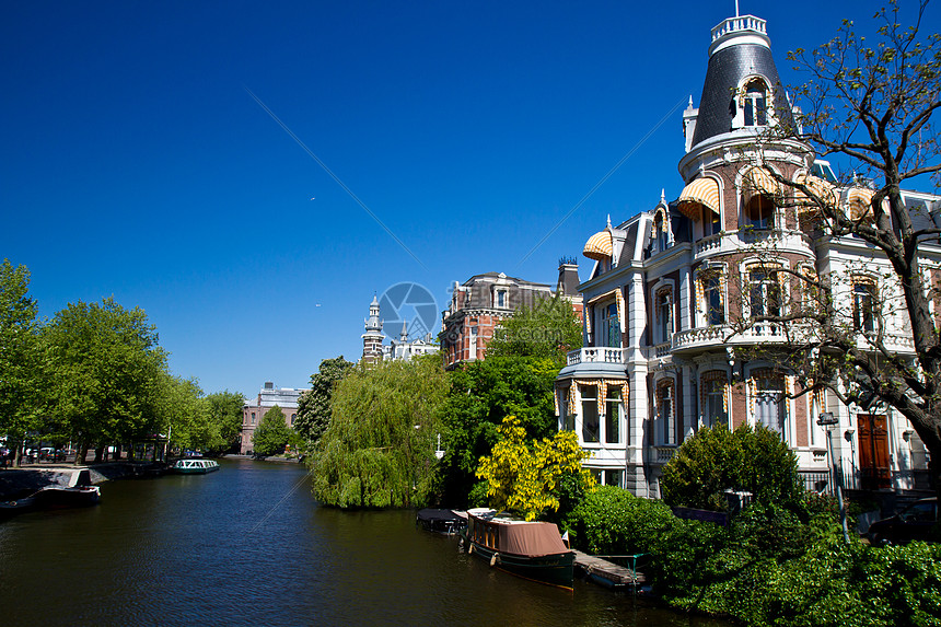 阿姆斯特丹的一条运河历史性首都特丹建筑学建筑人士景观历史游客商务图片