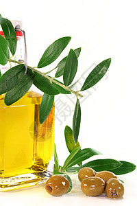 橄榄油橄榄枝绿色产物冷压油瓶美食家金黄色食物图片