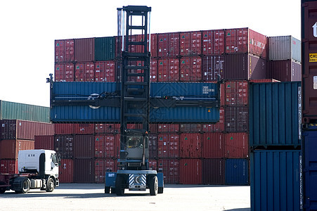 集装箱集装箱在港口托运卸载后勤船厂金属货运码头贸易送货商品起重机图片