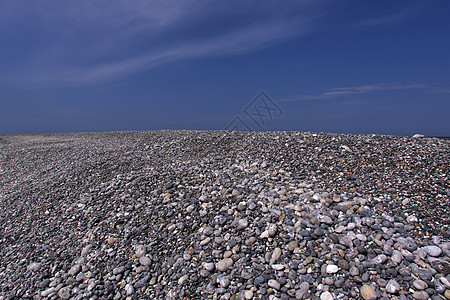沿海岸的弗林斯通硅胶卵石石头砾石材料地面花岗岩碎石巨石岩石图片