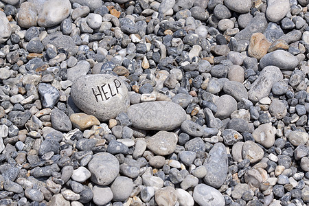 帮助沿海岸的火石巨石卵石材料砾石花岗岩硅胶岩石石头碎石瓦砾图片