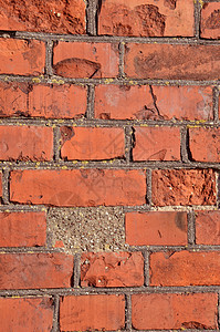 红砖墙石头接缝石膏建筑红色装饰砖墙黏土长方形石墙图片