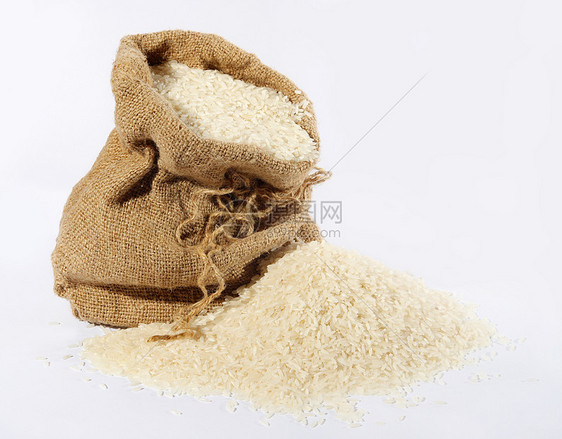 大米在麻袋中撒洒食物棉布盘子营养粮食植物宏观棕色麻布种子图片