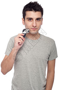 青年男子刮胡子卫生成人脸颊皮肤胡须男人白色剃刀剃须刀男性图片