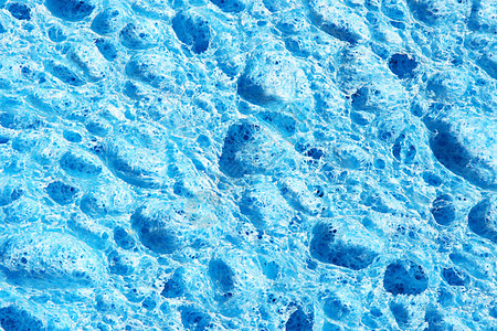 泡沫橡胶宏观 背景的泡沫瓦楞气泡波浪状软垫蓝色宽慰材料海绵橡皮塑料图片