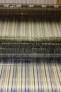 纺织机的紧闭工业纺纱自动化纺织机械化细节面料生产线程织物图片