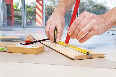 胶合板上工程师标识工具男士维修木匠木头测量正确性磁带建设者绘图图片