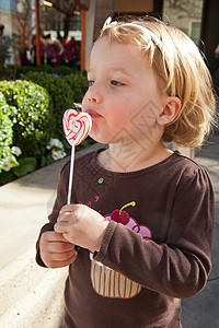 棒棒糖女性吮吸空腔金发食物孩子娃娃小吃玩具糖果图片