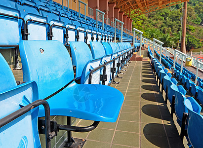 体育场座位公园剧院音乐会蓝色塑料游戏观众运动足球椅子图片
