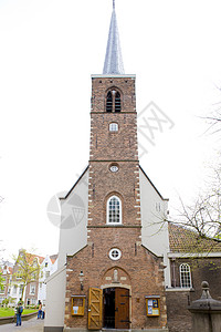 荷兰阿姆斯特丹Begijnhof省会旅行精神教会建筑物首都宗教建筑教堂外观背景图片