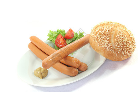 维纳香肠香菜盘子沙拉包子食物厨房芝麻饮食面包图片