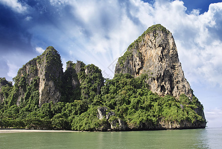 克拉比地区泰国岛上空的天空颜色热带蓝色血管旅行假期岩石海滩风景悬崖运输图片