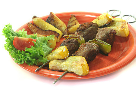 摩洛哥烧烤切片炙烤肉串盘子胡椒蔬菜肉丸沙拉土豆图片