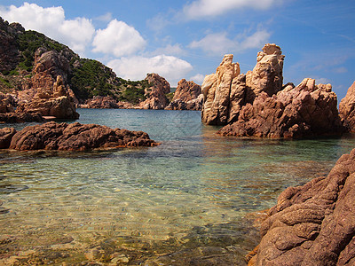 撒丁海岸天堂风景海滩岩石红色崎岖图片