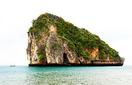 热带岛屿高悬崖旅行勘探岩石场景海滩蓝色编队天空海景支撑图片