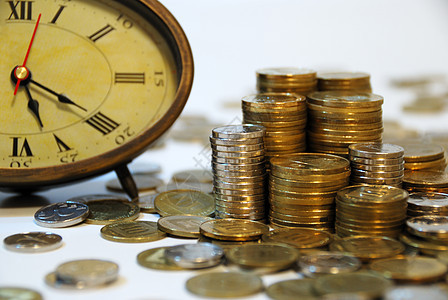 时间就是金钱交换金子金属金融小时团体商业硬币反射货币图片