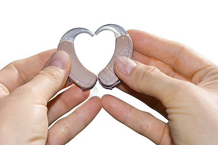 展示助听器的心脏医疗棕色乐器白色听力手指耳朵棕榈健康配饰图片