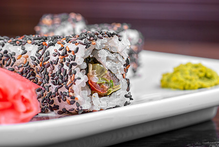 芝麻寿司鱼片宏观海鲜重量食物筷子海藻黄瓜大豆午餐图片
