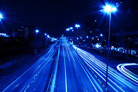 城市夜间交通街道曲线运动车辆运输线条场景市中心建筑小径图片