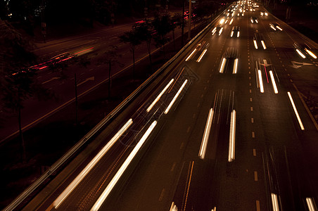 夜间交通城市条纹速度运输驾驶旅行场景踪迹基础设施汽车图片