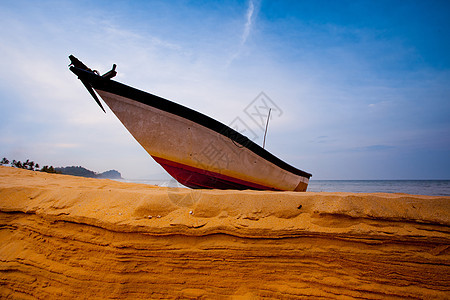 捆钓渔船天空旅行漂浮渔夫海洋血管海岸线支撑热带日落图片