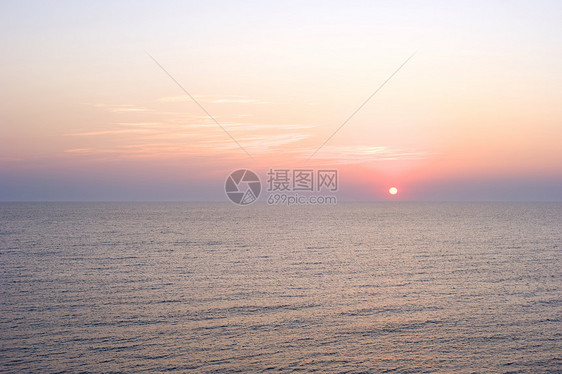 贝蒂丰日落海浪美丽场景海岸天空阳光海岸线全景太阳图片