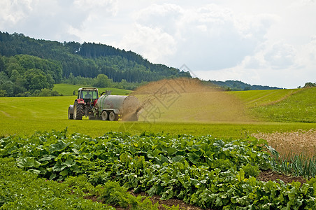 粪施肥草地牛粪机器农业机械液体拖拉机肥料场地图片