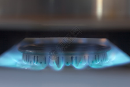 丙烷燃烧器的蓝色火焰辉光气体公用事业烤箱点燃天然气火炉烧伤甲烷宏观图片