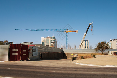 建筑起重机机械工作工程机器出租车高度构造建设城市蓝色图片