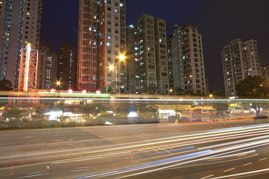 夜间城市交通繁忙速度商业场景蓝色隧道街道线条人行道戏剧性景观图片