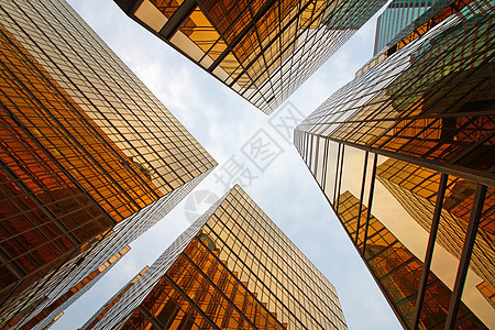 办公大楼白天摩天大楼商业玻璃反射办公室建筑天空城市镜子蓝色图片