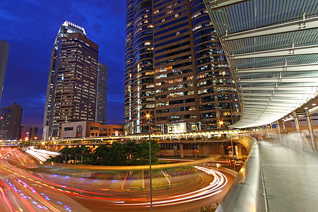 夜间通过香港市中心进行交通往来商业公共汽车运输旅行辉光市中心速度戏剧性景观线条图片