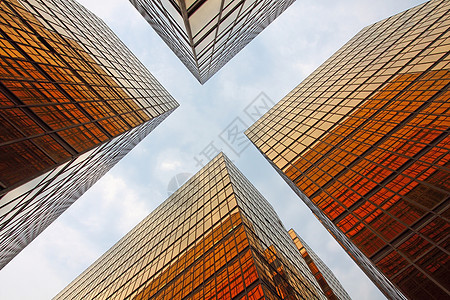 办公大楼白天摩天大楼城市建筑蓝色天空商业玻璃景观反射镜子图片