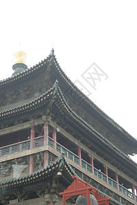 中国习安市中心的贝尔塔旅行建筑风格烟雾窗户文化公园建筑学历史衬套工作图片