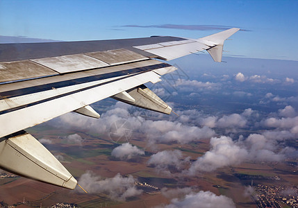 空气中飞行旅游翅膀旅行航班天空航空假期高度土地图片