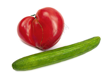 一个巨大的心形番茄 最长的黄瓜背景图片
